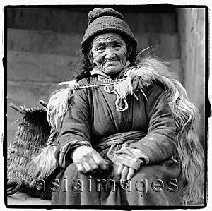 Asia Images Group - India, Ladakh, Leh, Portrait of elderly lady sitting.