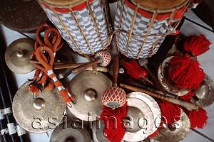 Asia Images Group - Indonesia, Bali, Gianyar, Cremation ceremony, gamelan instruments. (grainy)