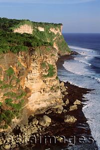 Asia Images Group - Indonesia, Bali, Uluwatu, View of cliffs and temple. (grainy)