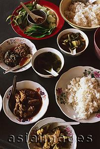 Asia Images Group - Myanmar (Burma), Kyaiktiyo, Burmese food selection at roadside food stall.