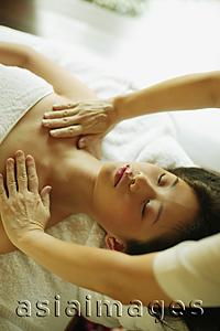 Asia Images Group - Young woman being massaged