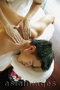 Asia Images Group - Young man receiving back massage