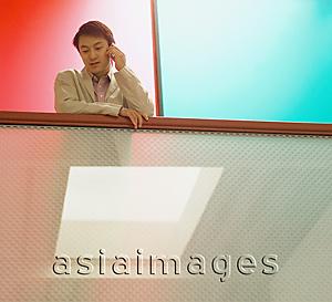 Asia Images Group - Young man on mobile phone