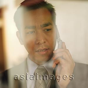 Asia Images Group - Businessman on mobile phone
