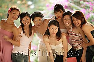 Asia Images Group - Group of young women, looking at camera, smiling
