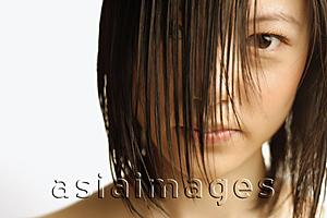 Asia Images Group - Young woman with wet hair, head shot
