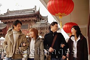 Asia Images Group - Couples walking arm in arm, smiling