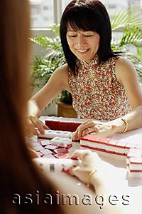 Asia Images Group - Two women playing mahjong