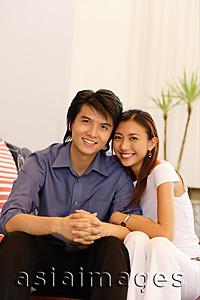 Asia Images Group - Couple looking at camera, smiling