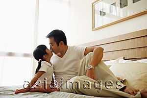 Asia Images Group - Father kissing daughter