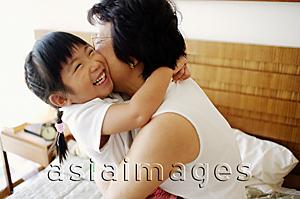 Asia Images Group - Granddaughter hugging grandmother