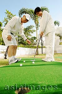 Asia Images Group - Senior couple playing golf