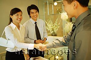 Asia Images Group - Executives shaking hands