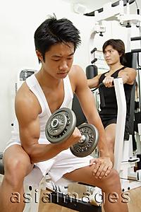 Asia Images Group - Young men working out in gum