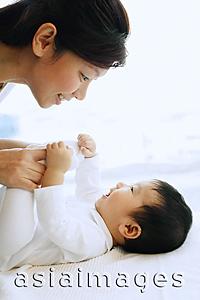 Asia Images Group - Mother and baby boy, bonding