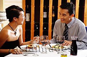 Asia Images Group - Couple eating in restaurant