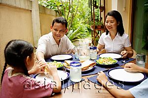 Asia Images Group - Family having meal, outdoor
