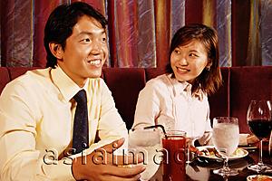 Asia Images Group - Couples sitting at restaurant, having dinner