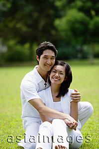 Asia Images Group - Couple embracing, smiling at camera