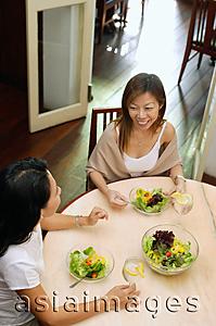 Asia Images Group - Women having a meal of salad, high angle view