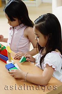 Asia Images Group - Two girls playing with building blocks