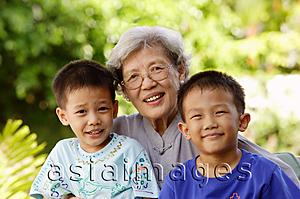 Asia Images Group - Grandmother with two grandsons