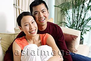 Asia Images Group - Couple at home, looking at camera