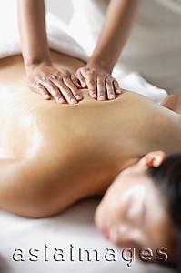 Asia Images Group - Woman undergoing back massage