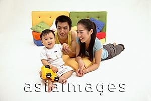 Asia Images Group - Young parents with one child, portrait