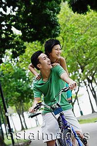 Asia Images Group - Couple on tandem bicycle