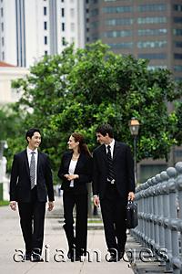 Asia Images Group - Business people walking side by side, talking