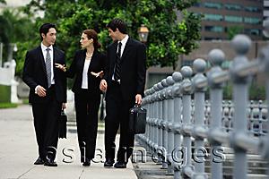 Asia Images Group - Business people walking in a row, talking