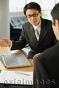 Asia Images Group - Businessmen having a discussion