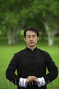 Asia Images Group - Man in park, meditating