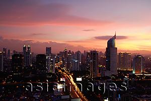 Asia Images Group - Sunset view of the CBD, with building construction and skyscrapers along Jalan Jend Sudirman