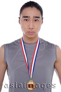 Asia Images Group - One athlete with medal around his neck