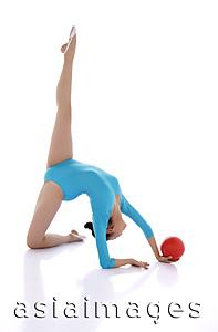 Asia Images Group - Rhythmic gymnastics, woman doing routine with ball