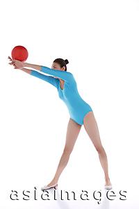 Asia Images Group - Gymnast performing rhythmic gymnastics with ball