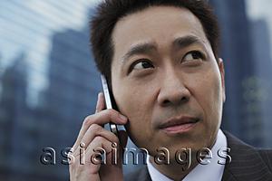 Asia Images Group - Head shot of mature man talking on phone