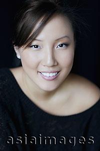 Asia Images Group - Head shot of woman smiling