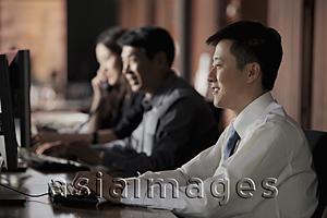 Asia Images Group - Business people working together in an office