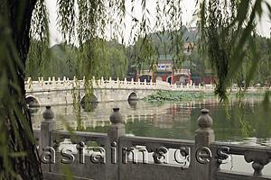 Asia Images Group - Scenic view of stone bridge and lake. Beihai Park, China