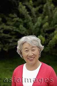 Asia Images Group - Head shot of older woman with grey hair