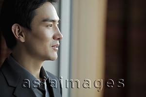 Asia Images Group - Profile of man wearing a jacket