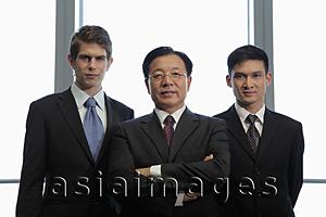 Asia Images Group - Three businessmen standing together