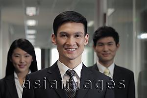 Asia Images Group - Head shot of three businesspeople in office