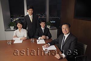 Asia Images Group - People sitting at table in business meeting