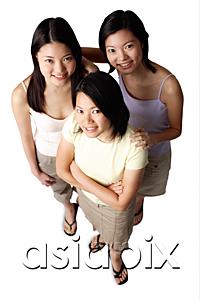 AsiaPix - Three young women, looking up at camera, portrait