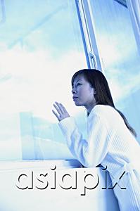 AsiaPix - Woman leaning on ledge, looking through window