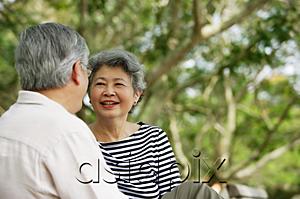 AsiaPix - Mature couple facing each other, woman smiling